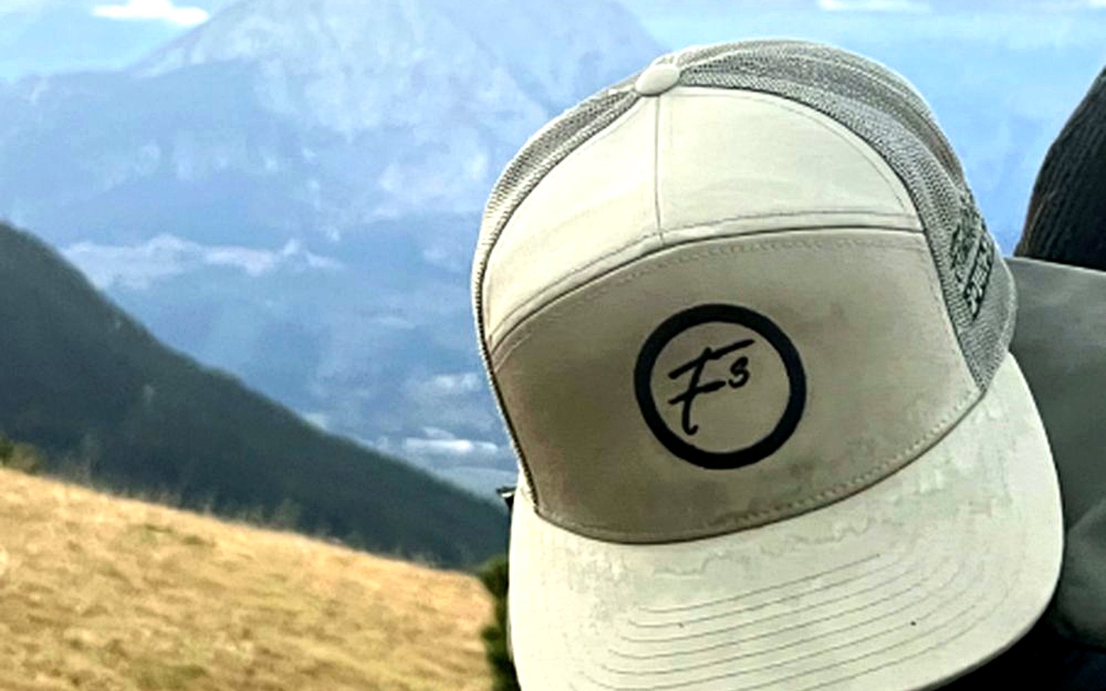 F3 hat in a mountain landscape